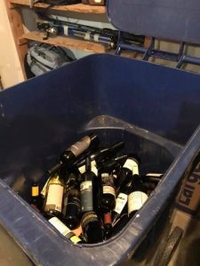 recycle bin filled with bottles